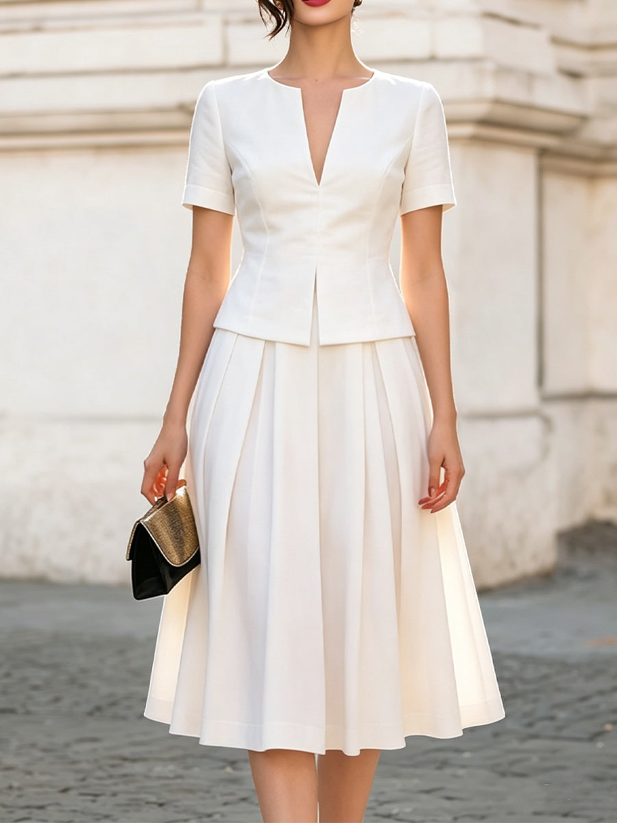 Split-neck short-sleeve peplum top and pleated A-line midi skirt two-piece set